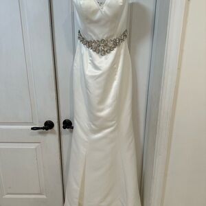 Elegant White Gown with Embellished Waist